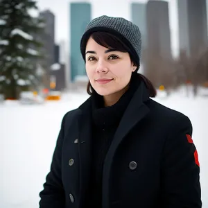 Attractive businesswoman in suit smiling confidently in office