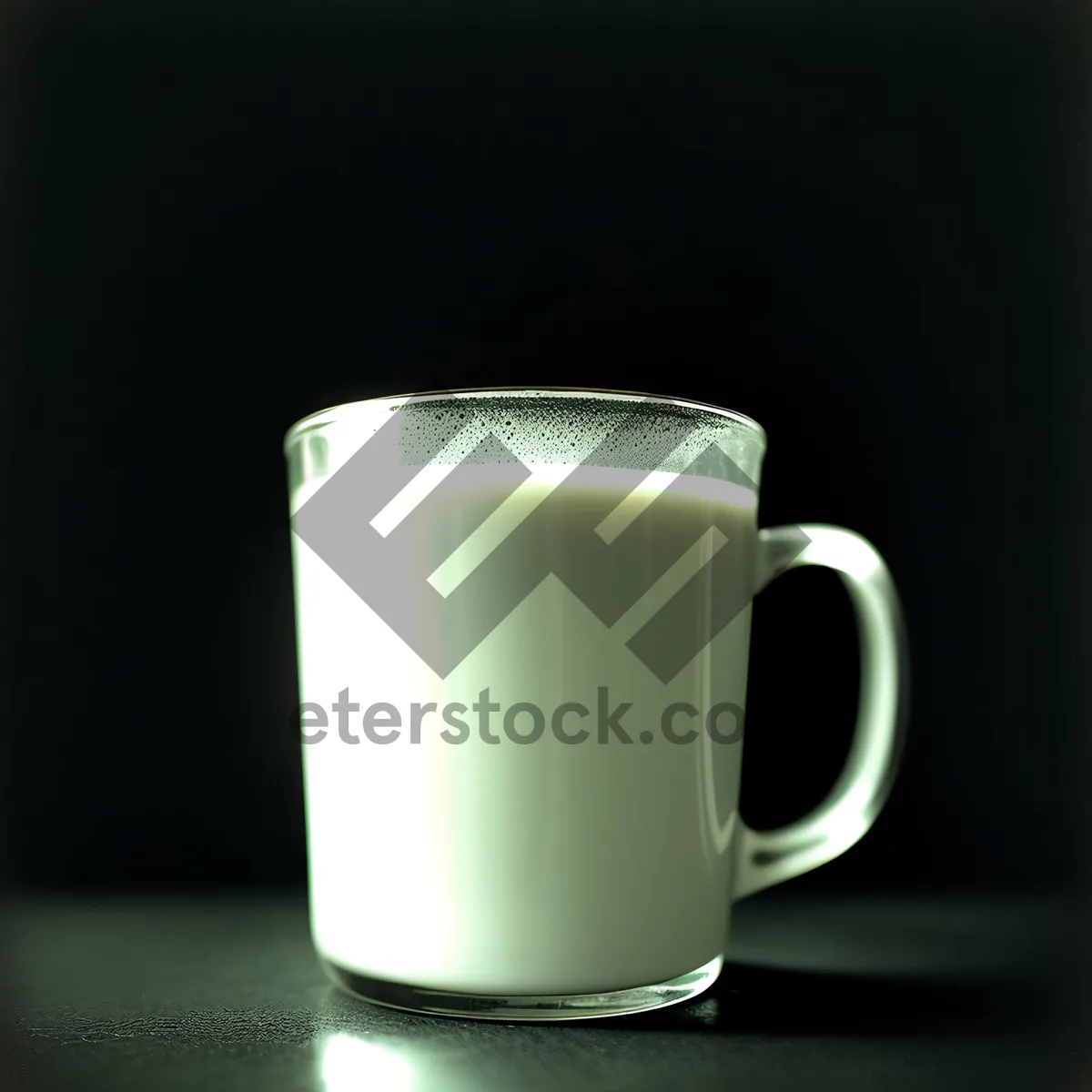 Picture of Hot Coffee in Brown Mug with Spoon on Table