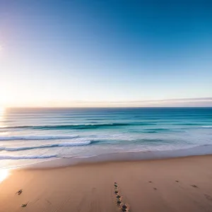 Turquoise Paradise: Tranquil Beachscape Under Sunny Skies