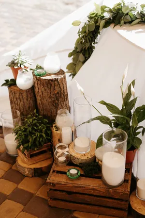 Table setting with flower-filled container and tea cup