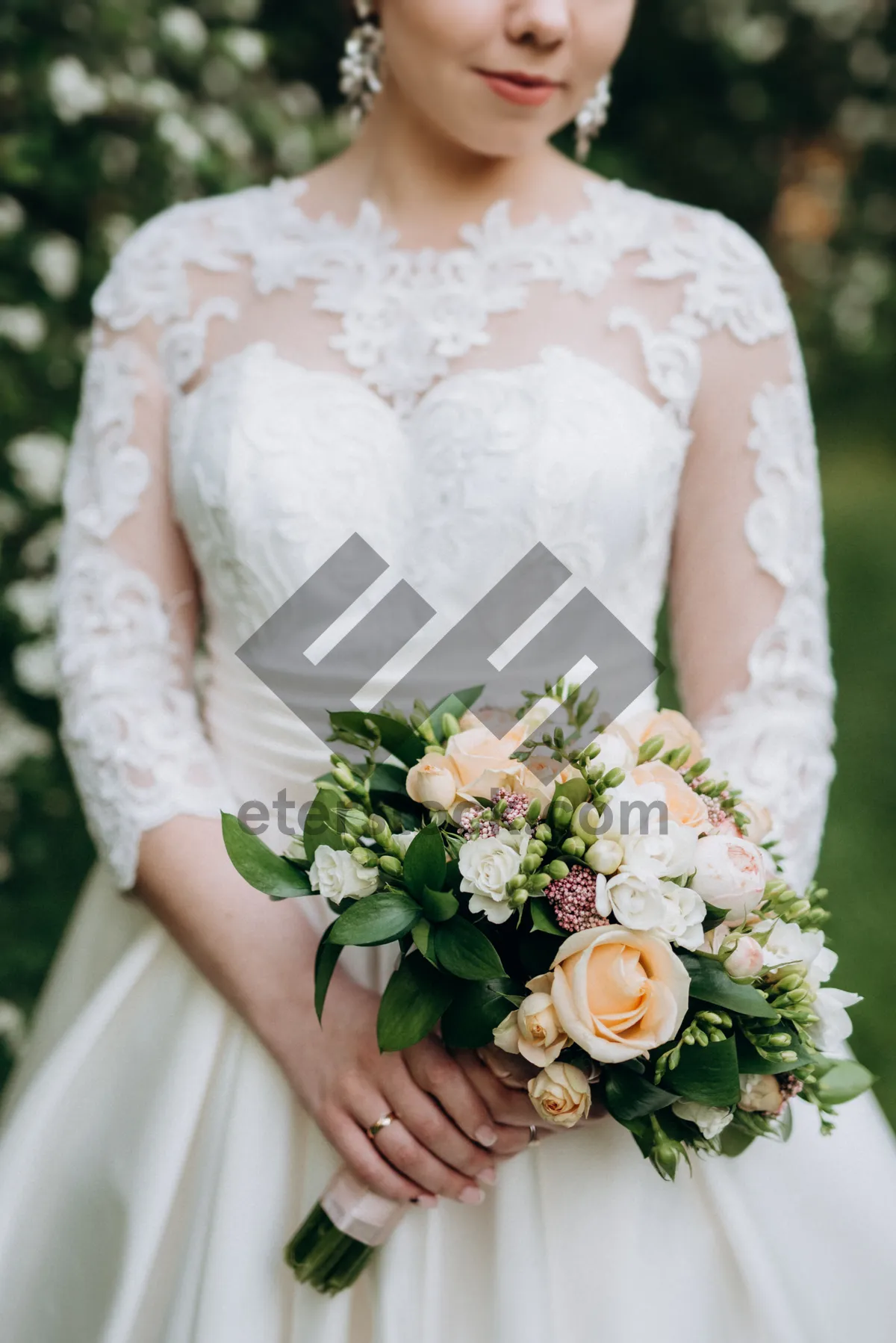 Picture of Happy Wedding Couple in Floral Bouquet