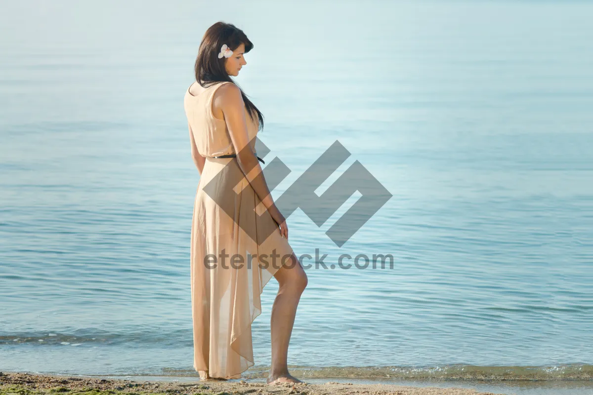 Picture of Happy person enjoying beach vacation in stylish clothing