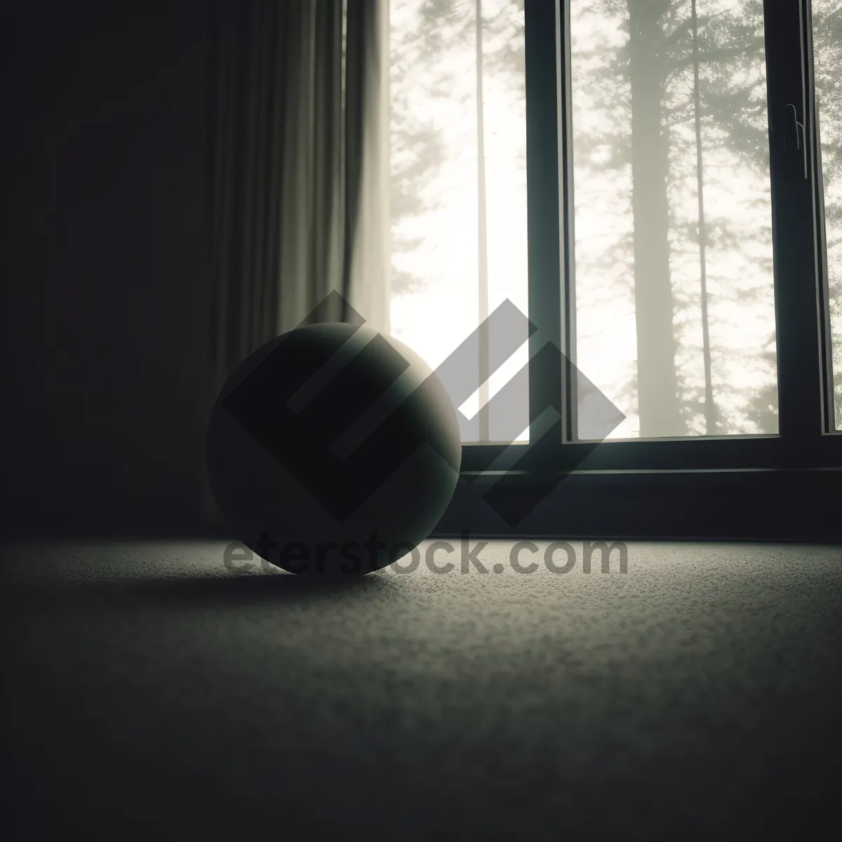 Picture of Black Pool Table Ball on Windowsill