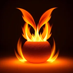 Fiery Blaze Illuminates Black Bonfire - Hot, Orange Flames