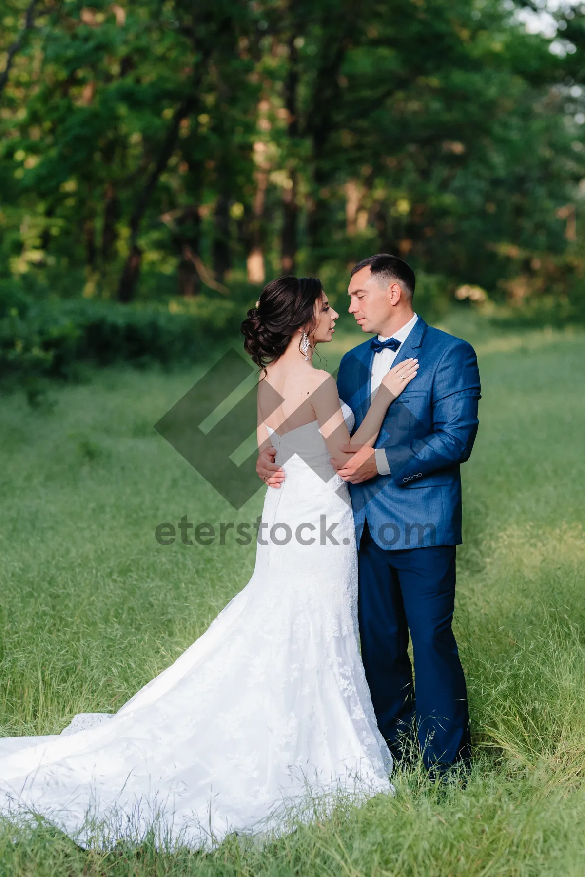 Picture of Happy Wedding Couple Smiling in the Park