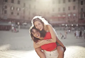 Smiling fashion model outdoors radiating happiness and joy