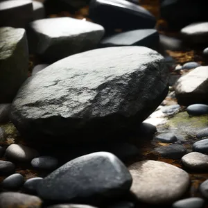 Waterfront rocks with mollusks and pebbles