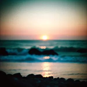 Golden Horizon: Tranquil Sunset over Tropical Coastline