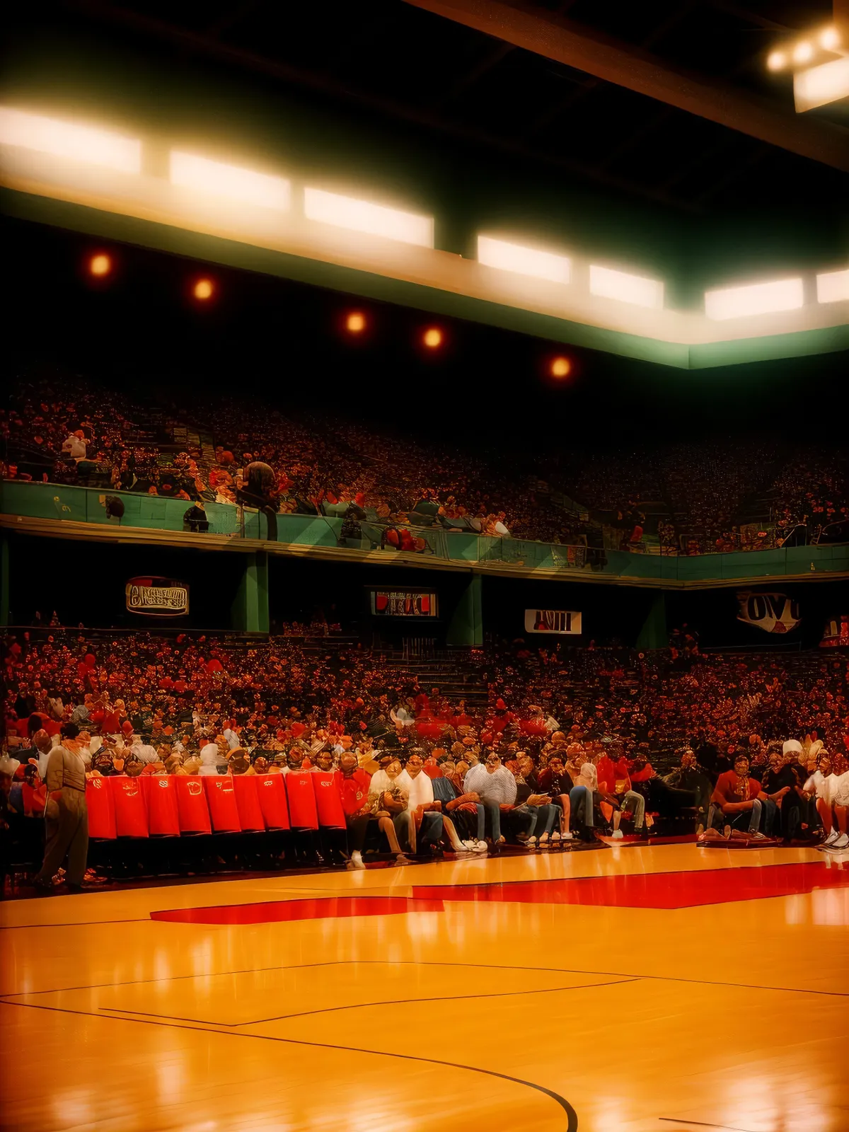 Picture of Vibrant stadium crowd cheering during a football match.