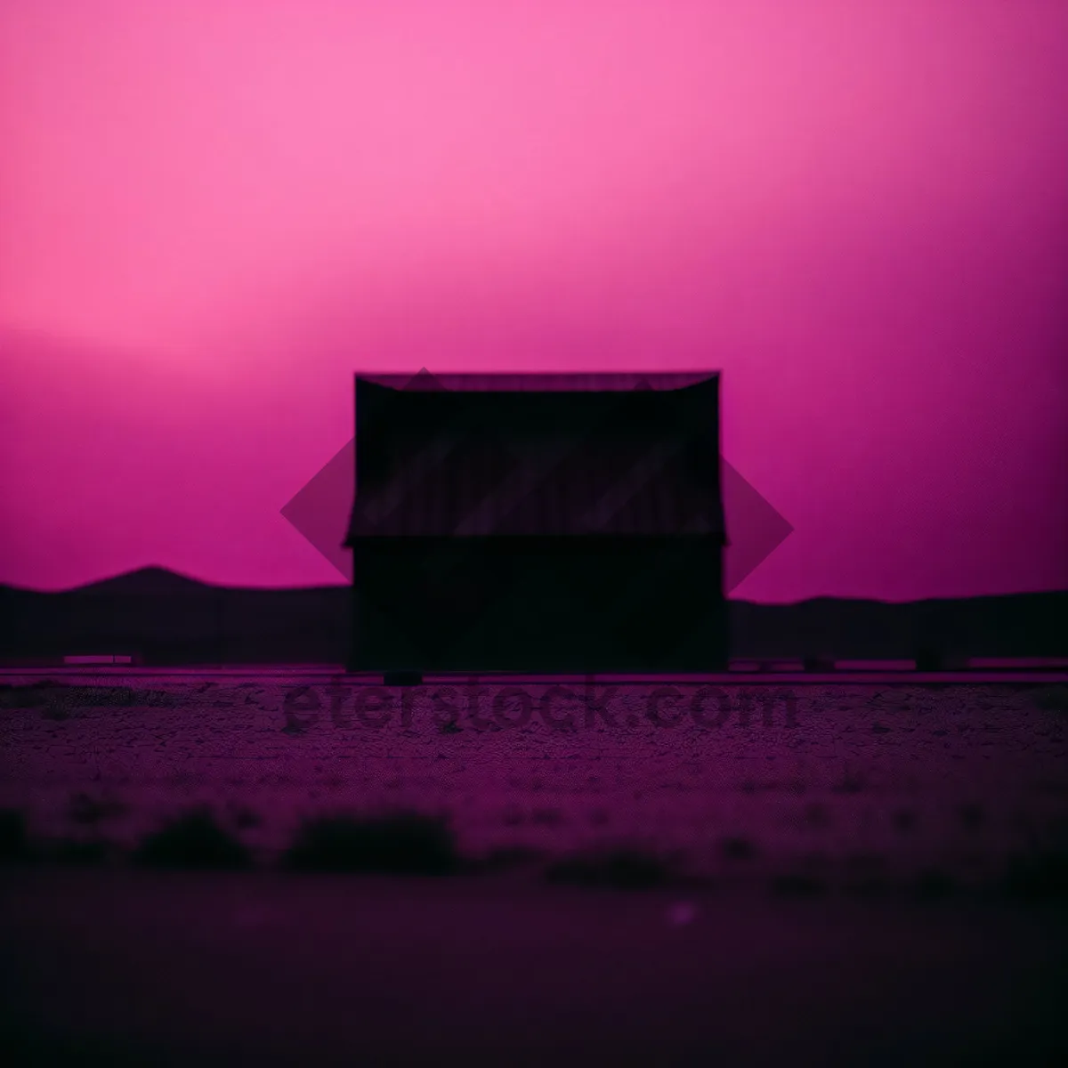 Picture of Sunset Silhouette Over Farm Building