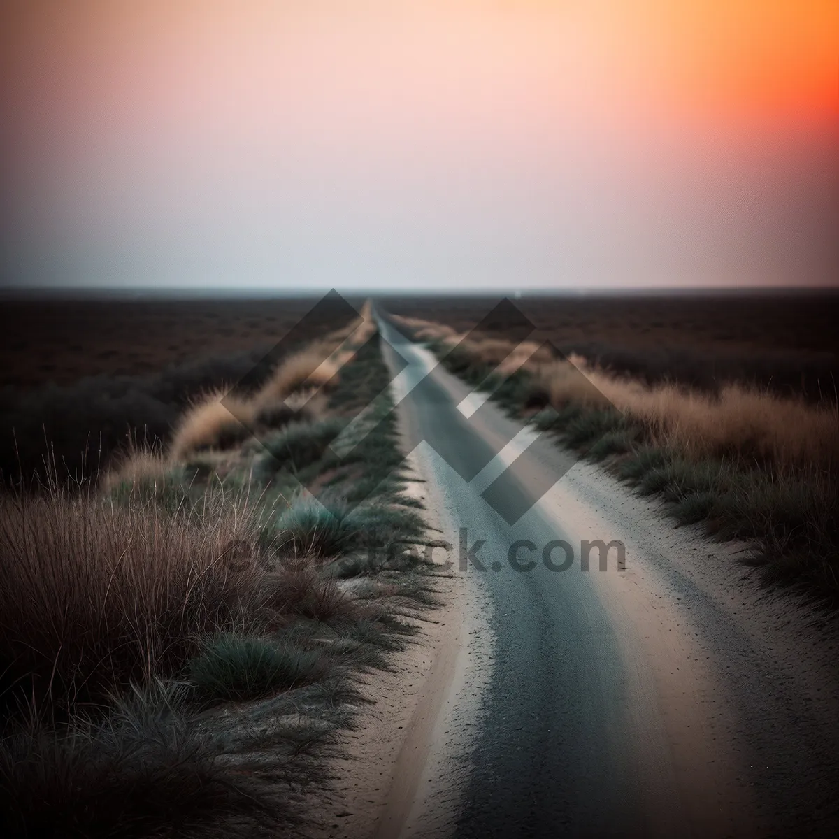 Picture of Sunset Road: Tranquil Rural Landscape with Asphalt Highway and Dreamy Sky