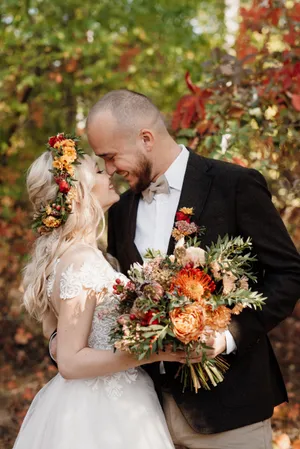 Happy couple celebrating their wedding day outdoors