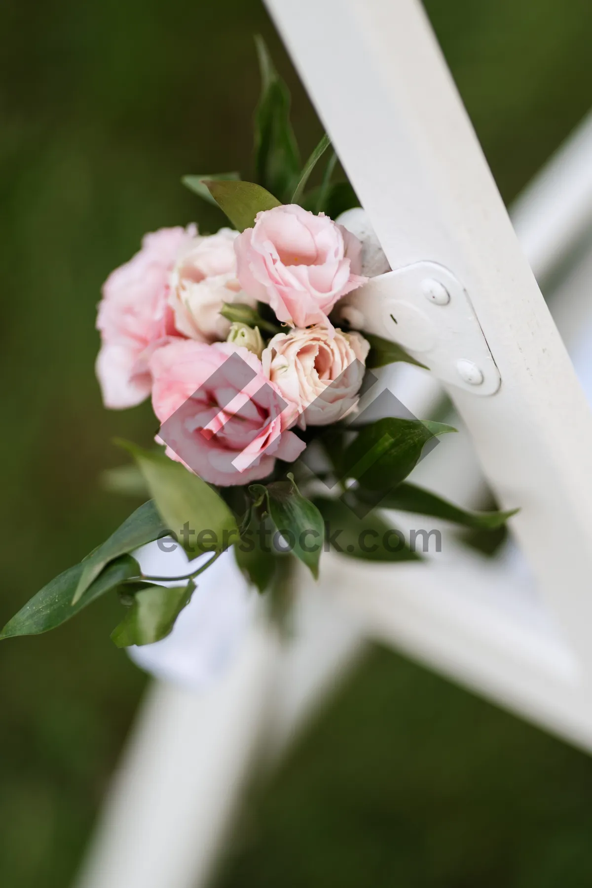 Picture of Romantic wedding bouquet with pink roses and jasmine flowers.