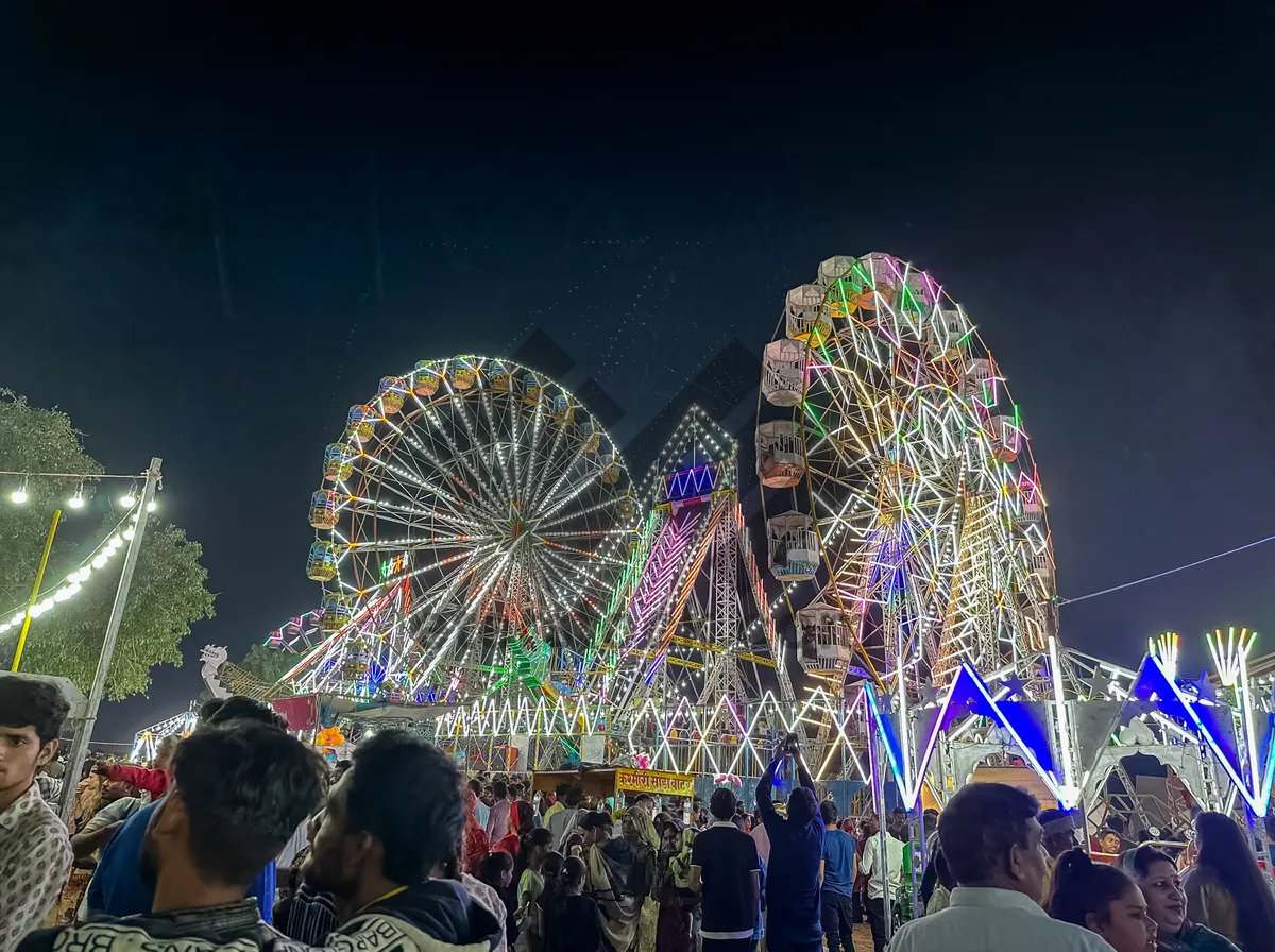 Picture of Festive Ferris Wheel Spinning in Night Sky