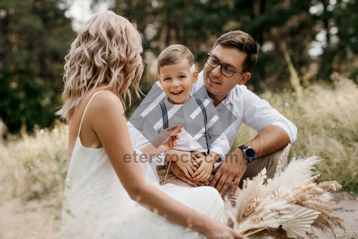 Picture of Happy family portrait in the park