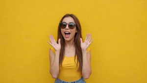 Attractive brunette lady in fashionable sunglasses smiling happily