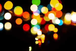 Vibrant Celebration Lights: Orange & Yellow Glow Circle