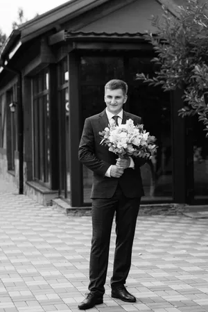 Happy newlywed couple with brass instruments at wedding.