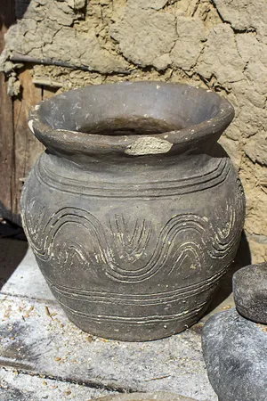 Traditional ceramic tea cup and pot vessel.