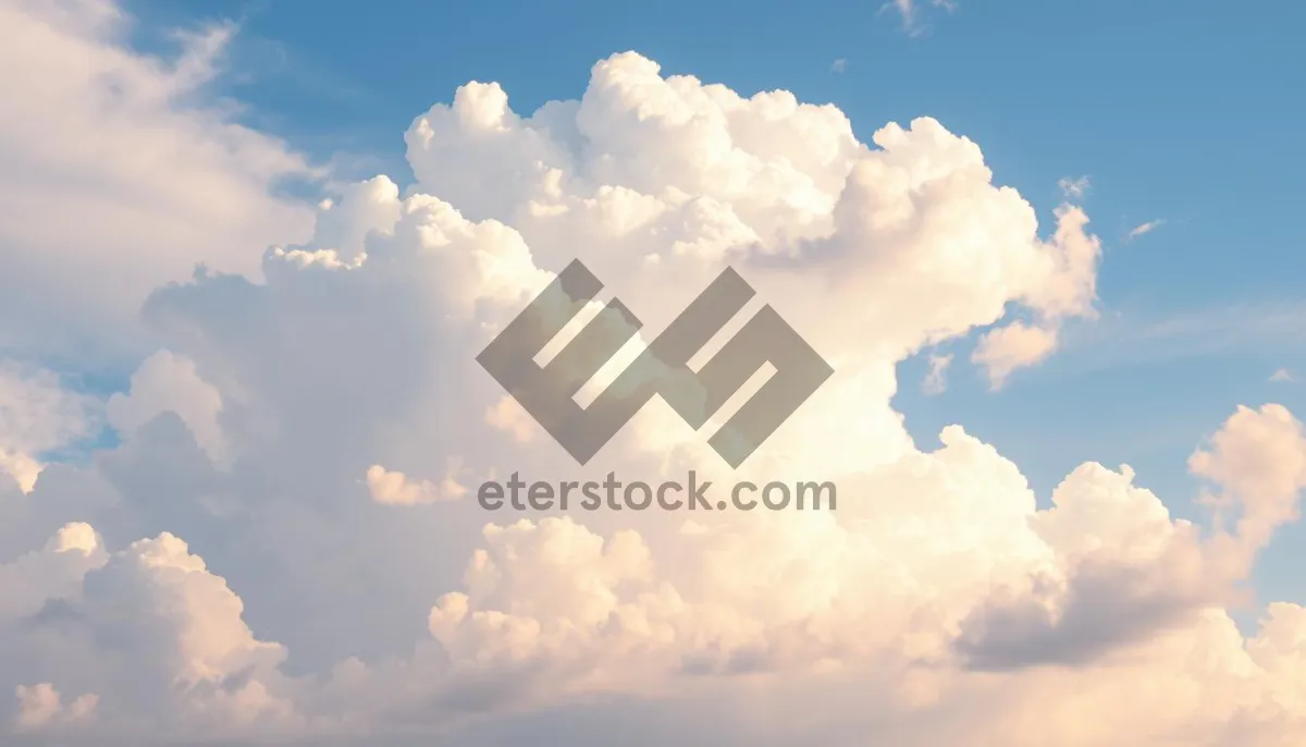 Picture of Summer sky with bright clouds and sunshine