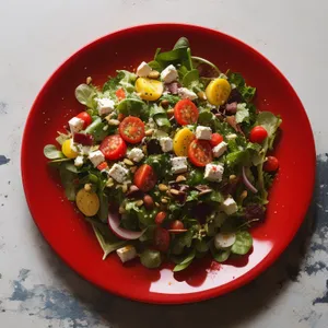 Fresh vegetable salad with gourmet meat and hot pepper.