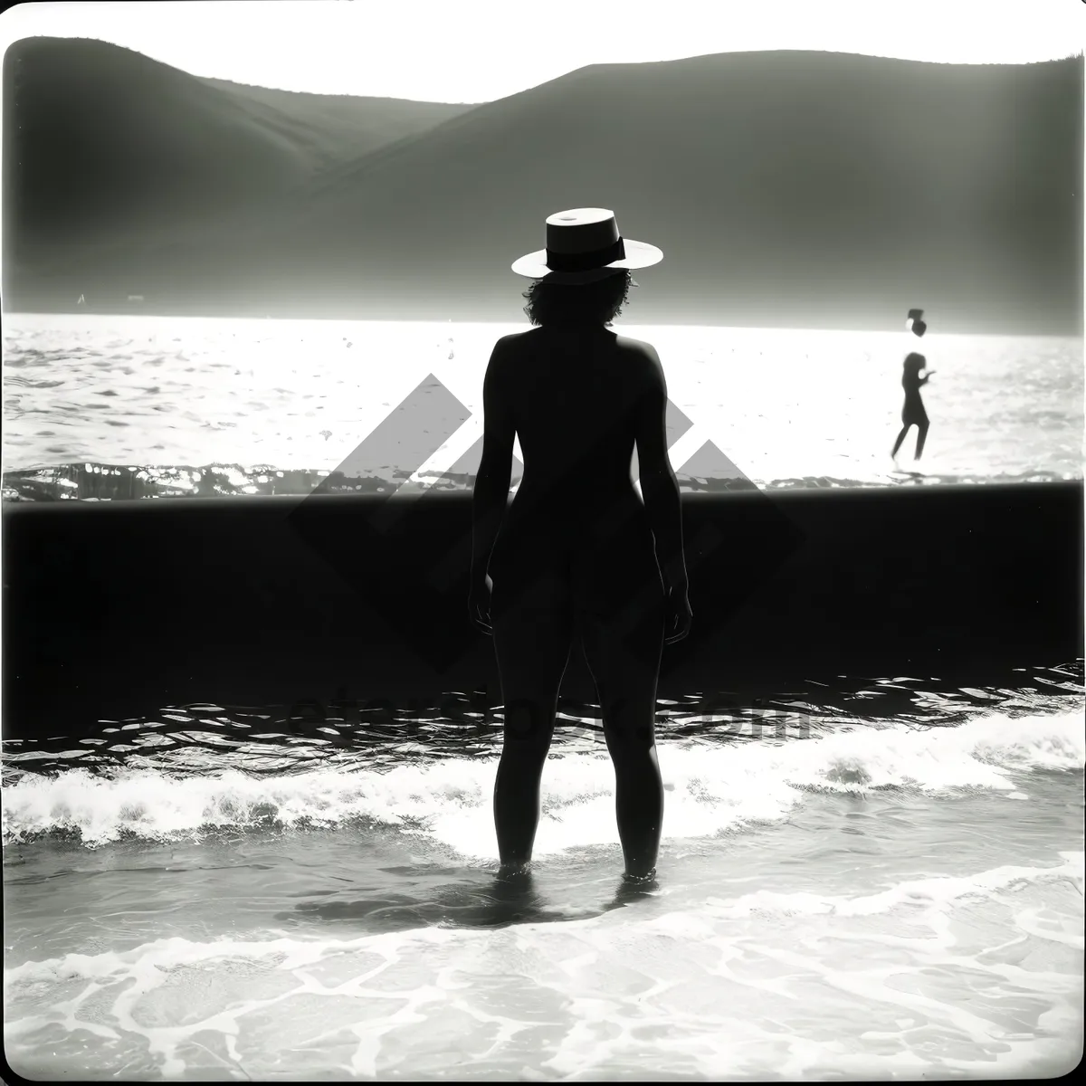 Picture of Sunset Beach Vacation: Silhouette of a Fisherman at Sea