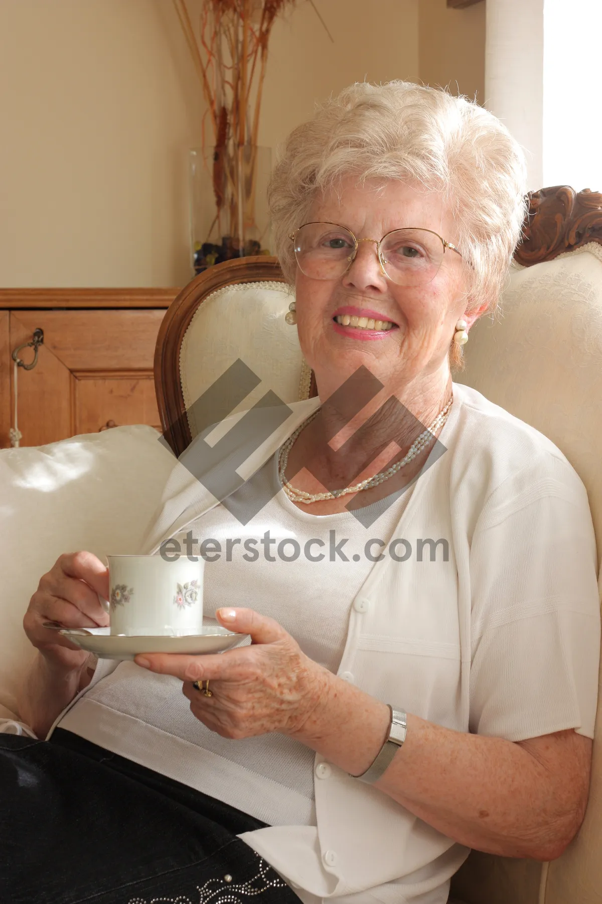 Picture of Happy smiling senior man sitting at home.