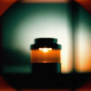 LED Pill Bottle Illuminating Dark Glass Vessel