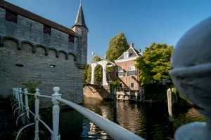 Medieval castle by the river in historic town