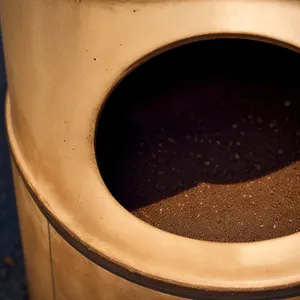 Steaming Cup of Espresso with Coffee Beans