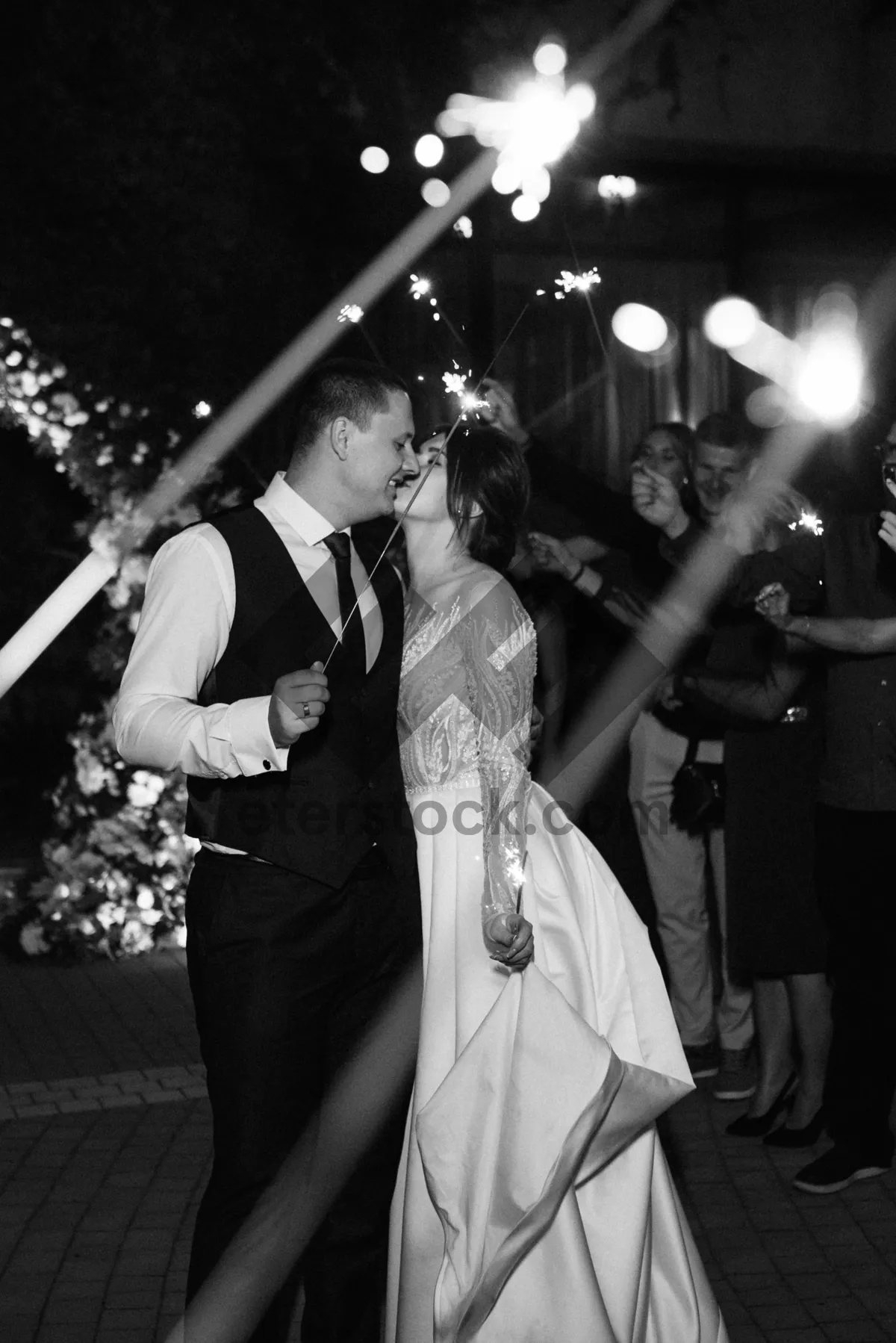 Picture of Attractive model posing with drumstick in low light