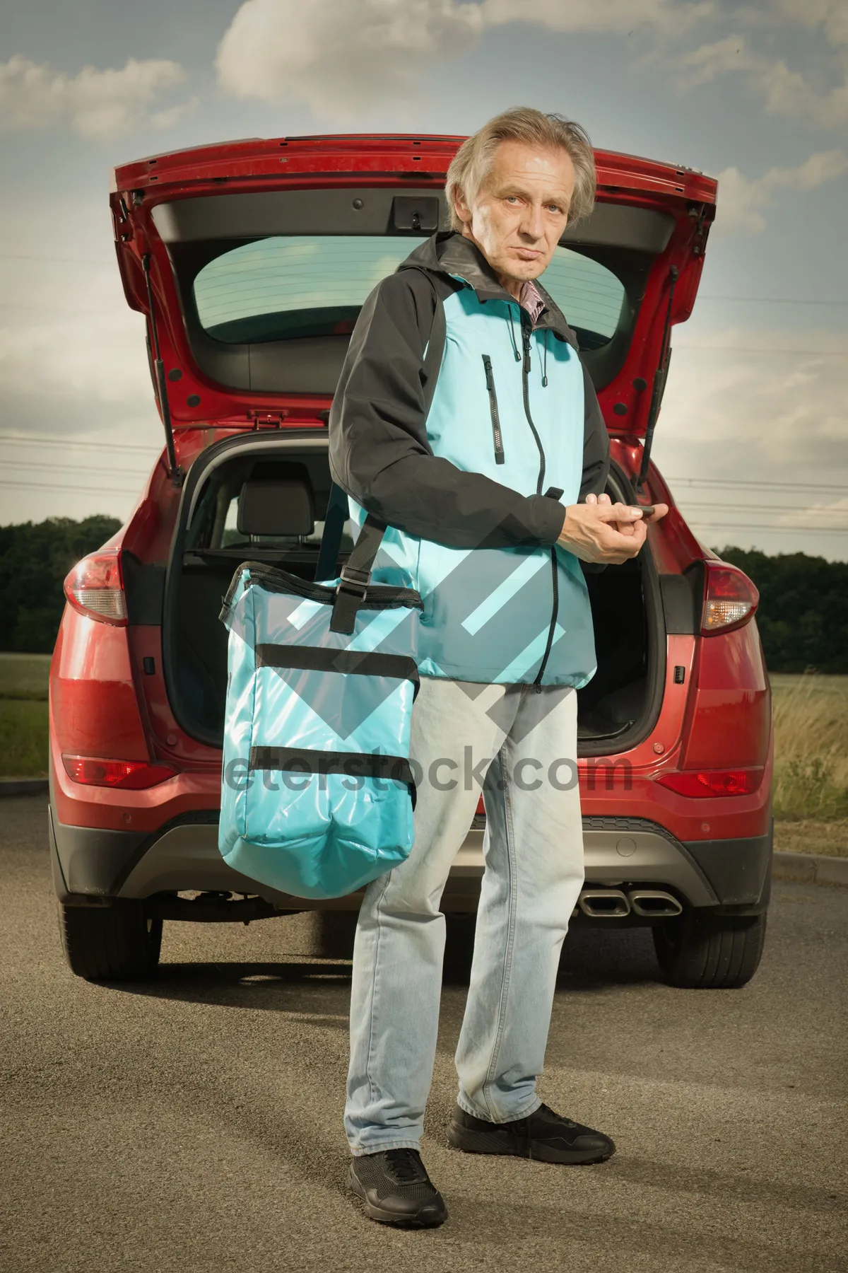 Picture of Man driving golf cart outdoors