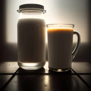 Hot coffee in brown mug with frothy foam