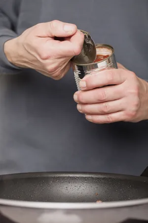 Man holding glass cup with strainer