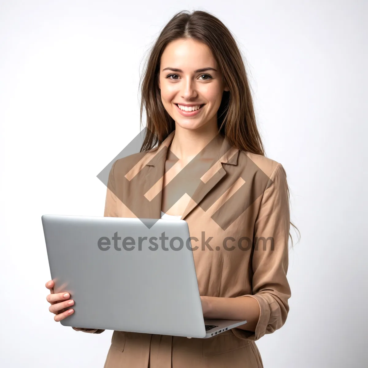 Picture of Happy businesswoman working on laptop in office