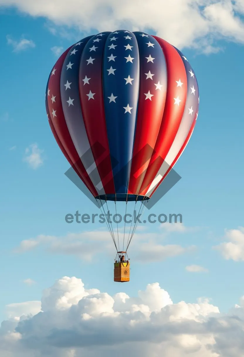 Picture of Colorful Hot Air Balloon Flying High in the Sky