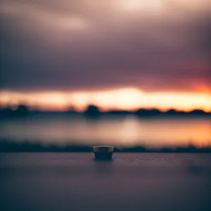 Sunset Reflection on a Calm Ocean Horizon