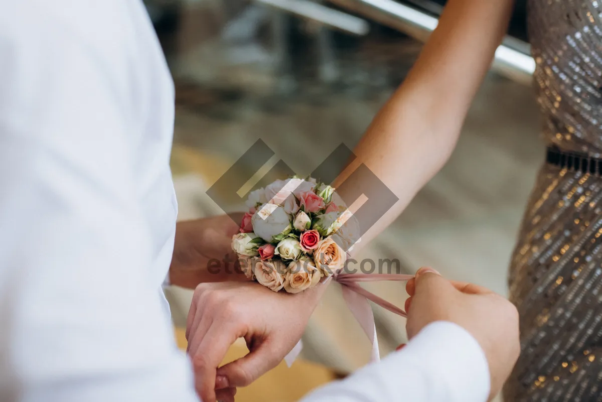 Picture of Happy couple celebrating love on wedding day holding hands