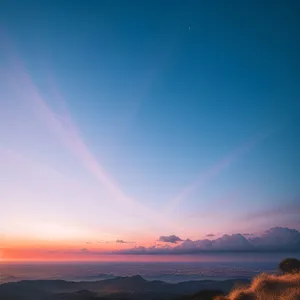 Vibrant Sunset Over Highland Mountain Landscape