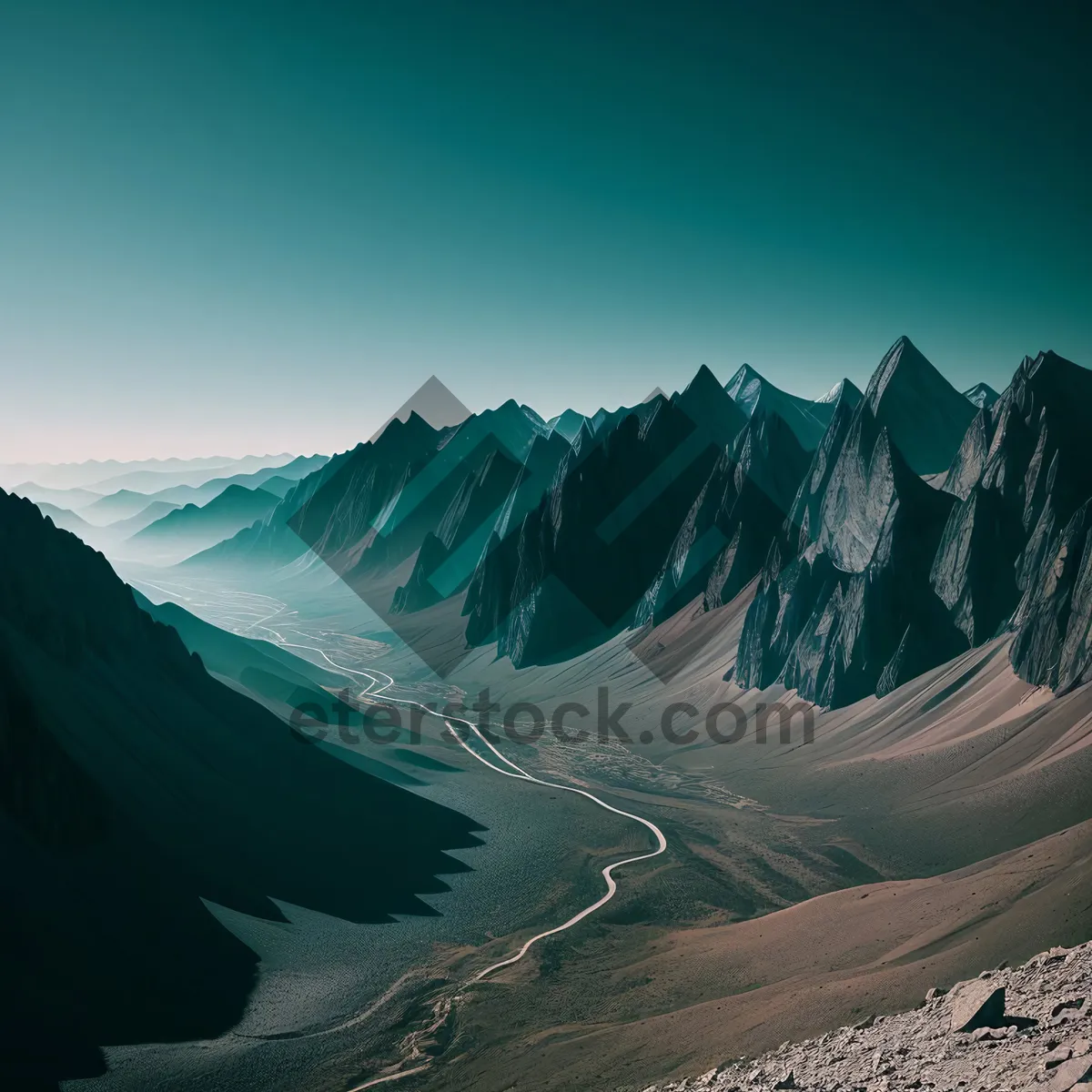 Picture of Snow-capped Mountains Standing Tall in Majestic Landscape.