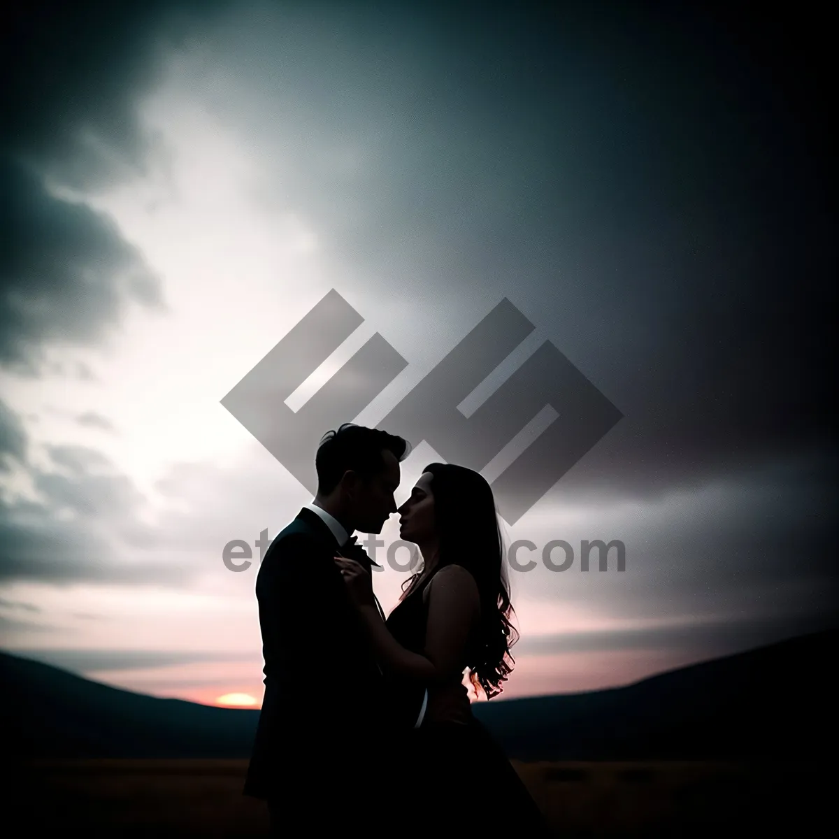 Picture of Romantic Silhouette of Happy Newlyweds at Sunset