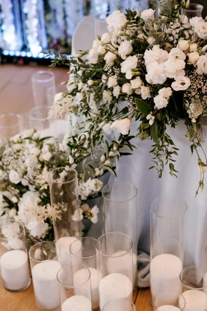 Wedding flower bouquet in glass vase on table