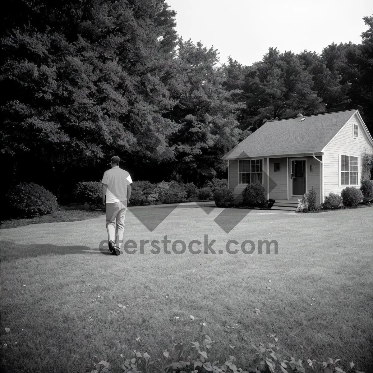 Picture of Idyllic Home nestled amidst lush landscape and picket fence