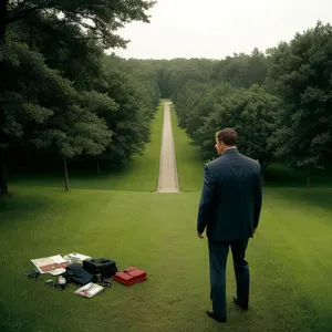 Man playing golf on lush green course