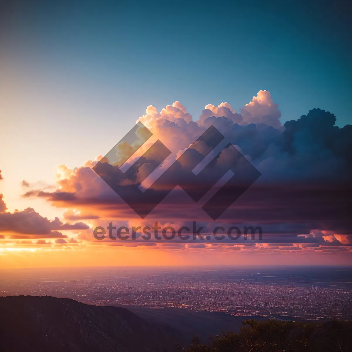 Picture of Vibrant Sunset Over Majestic Mountain Landscape