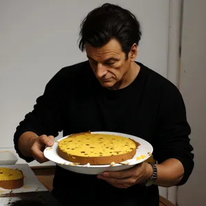 Man enjoying pizza at a cozy restaurant.