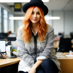 Attractive businesswoman portrait smiling in office setting