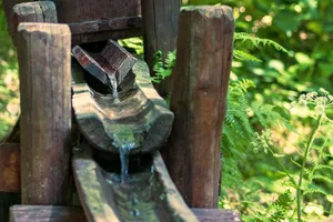 Rusty padlock on old wooden device