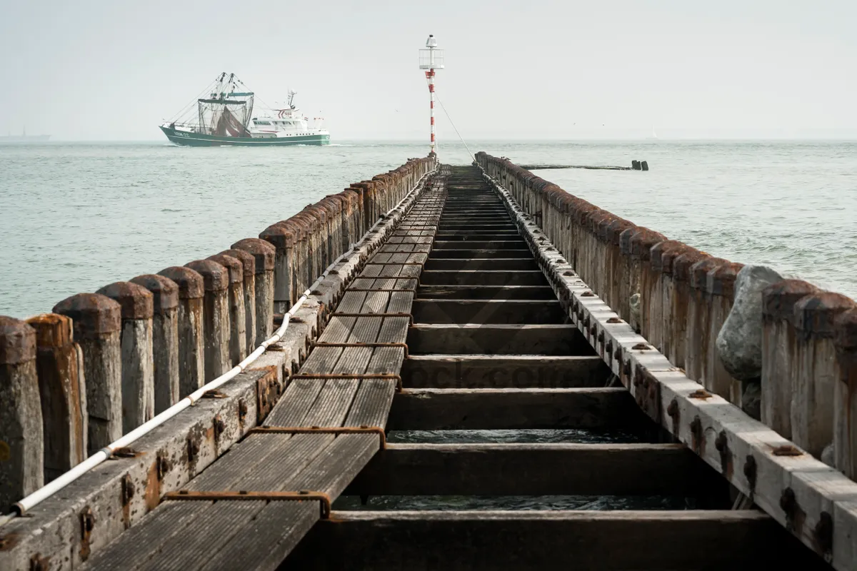 Picture of Wooden pier overlooking serene ocean waters