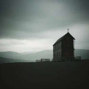 Old church tower against a stunning sunset